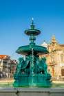 Lions Fountain (Fonte dos Leoes) and the Church of Our Lady of Carmo, Porto, Portugal. Art Print